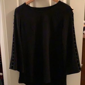 Black top with cut outs on sleeves